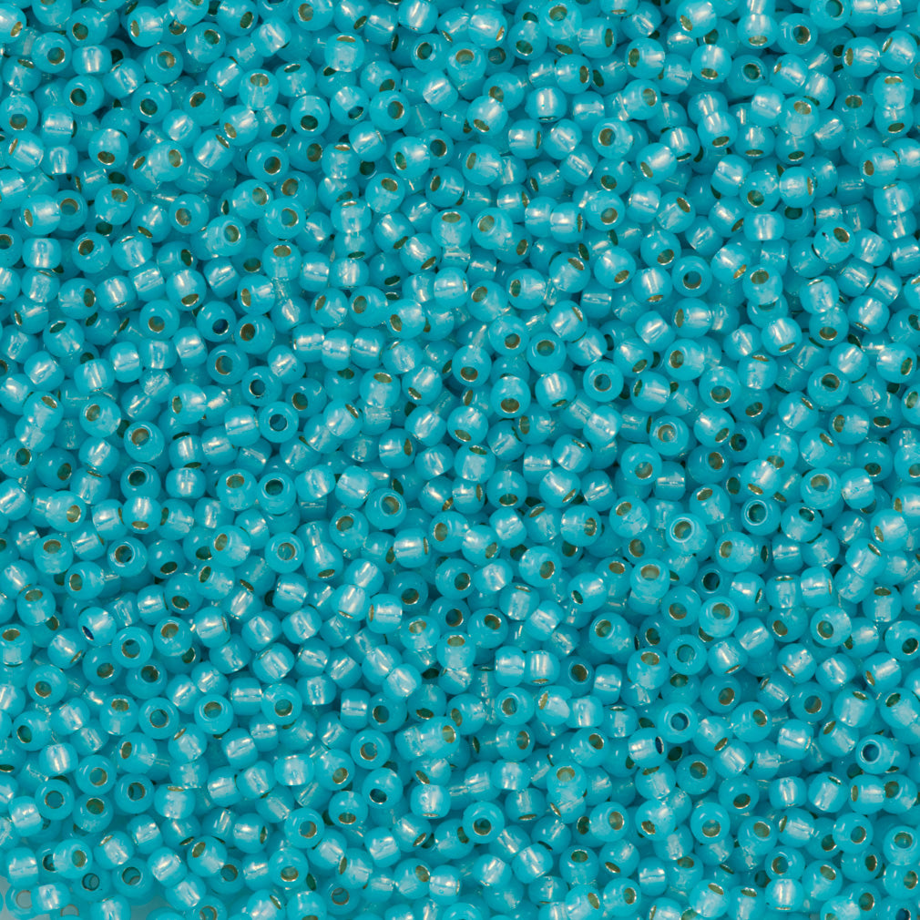 50g Toho Round Seed Bead 11/0 Permanent Finish Silver Lined Milky Aqua (2117PF)