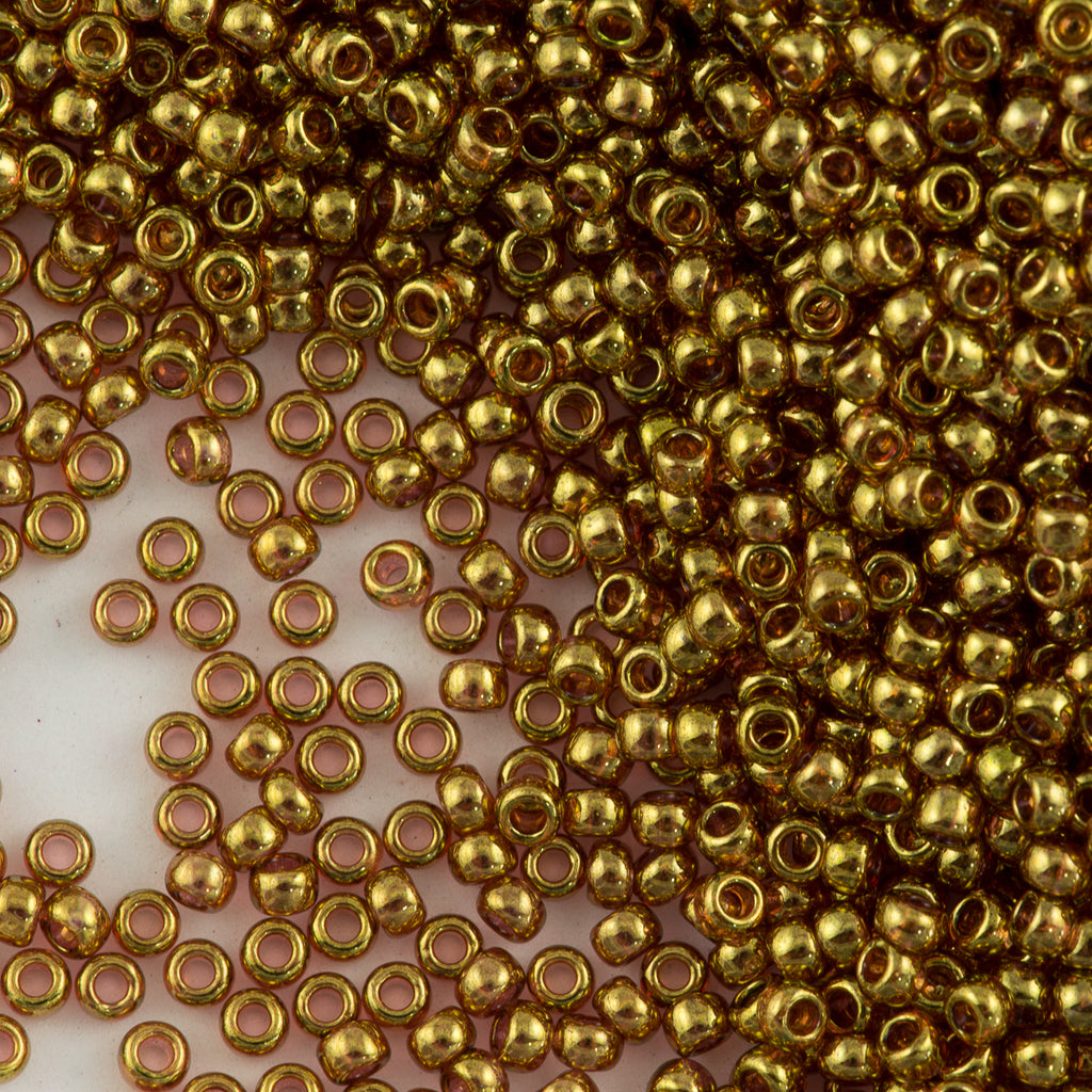 Toho Round Seed Beads 6/0 Gold Luster Transparent Pink (421)