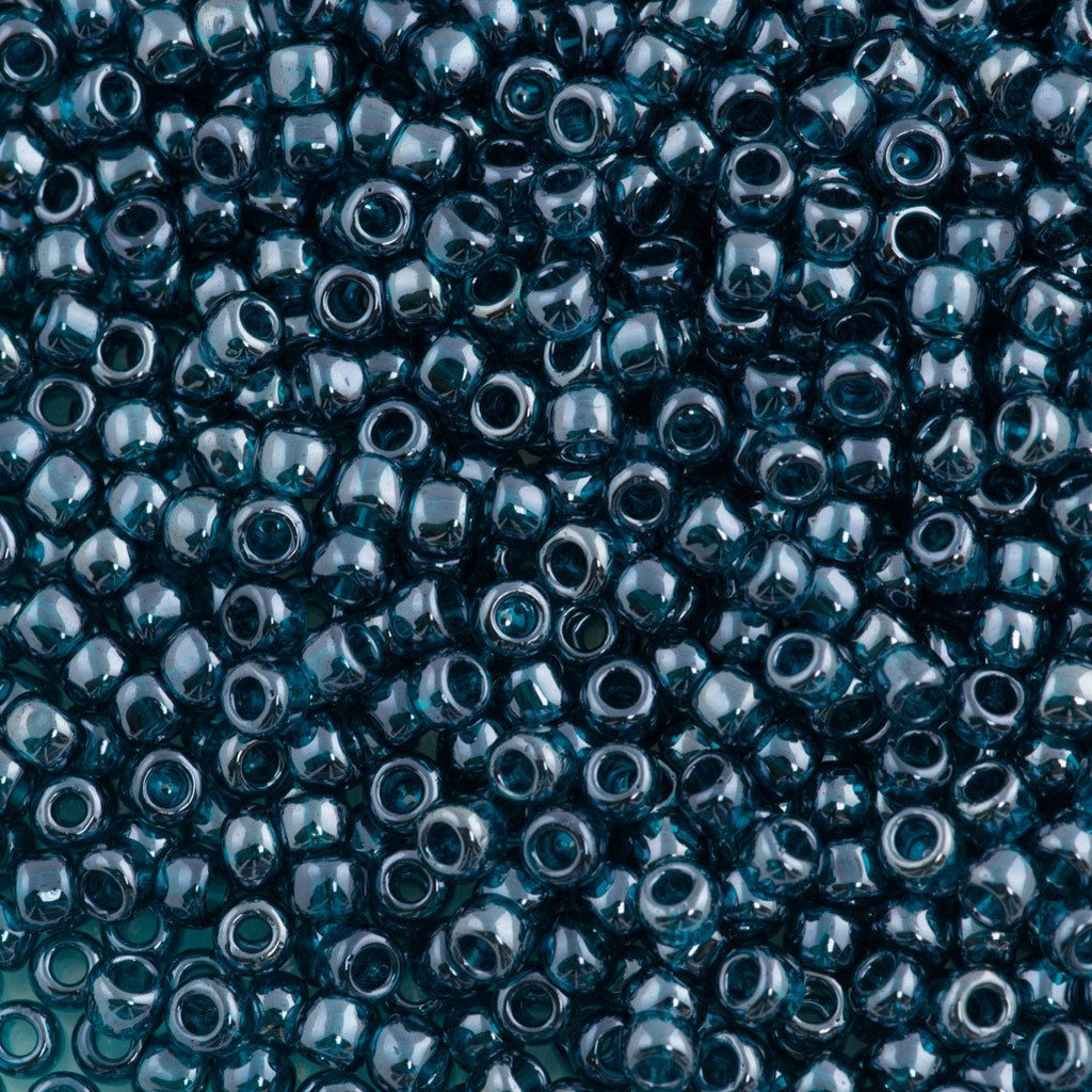 50g Toho Round Seed Beads 6/0 Transparent Teal Luster (108BD)