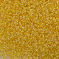 50g Czech Seed Bead 10/0 Crystal Lined Pale Yellow Terra (38381)