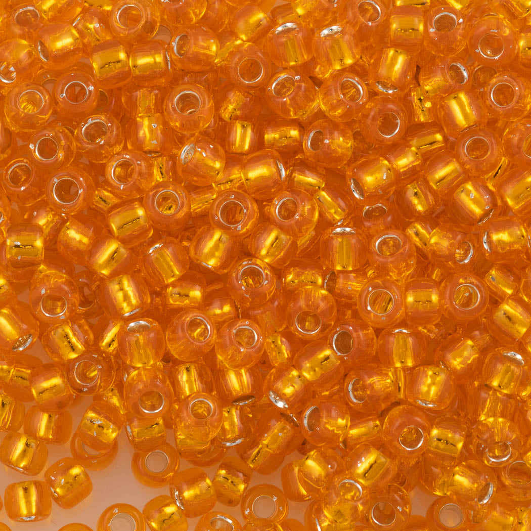 50g Toho Round Seed Beads 6/0 Silver Lined Tangerine (30B)
