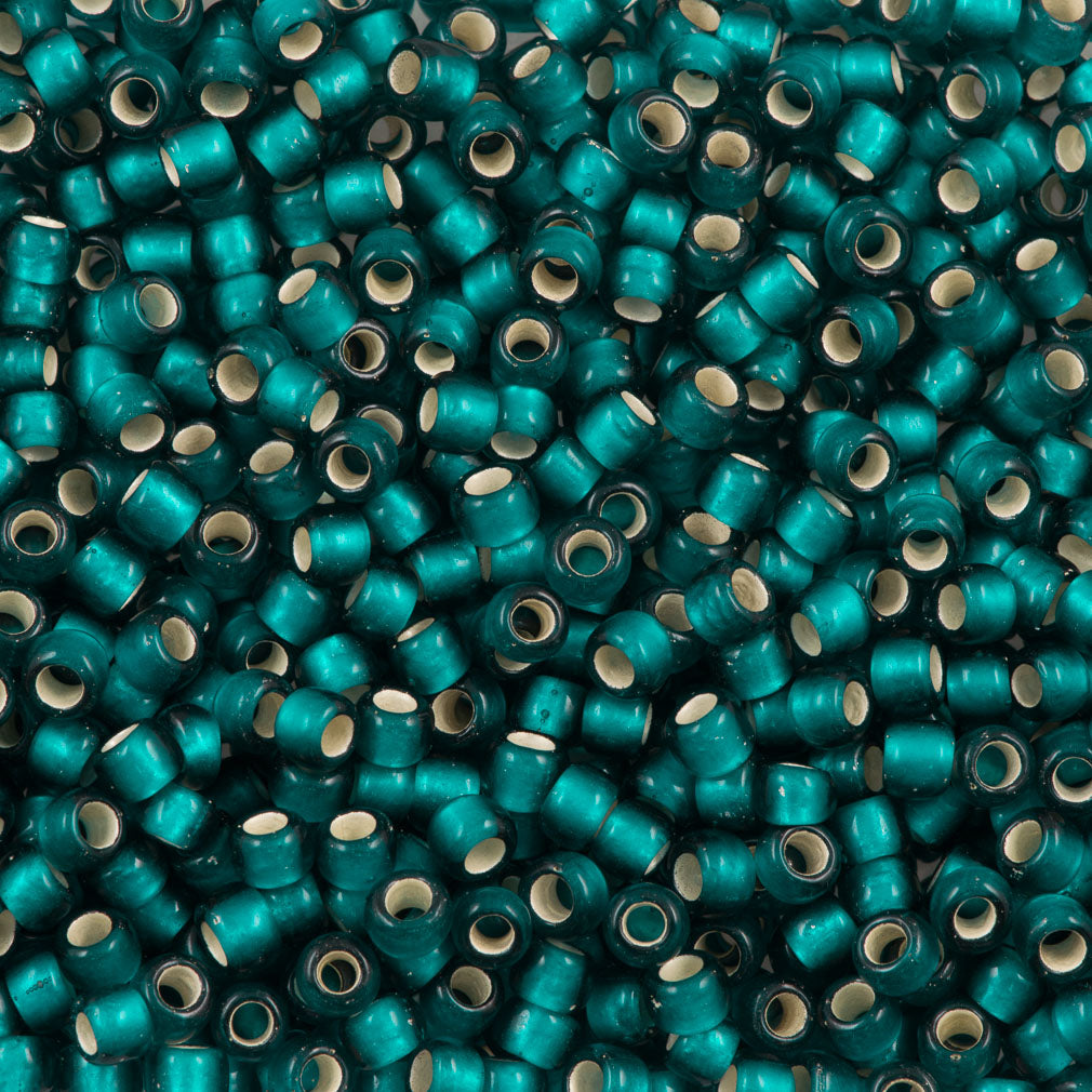 Toho Round Seed Beads 6/0 Transparent Matte Dark Teal Silver Lined 2.5-inch tube (27BDF)