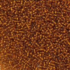 50g Toho Round Seed Bead 8/0 Silver Lined Marmalade (2154S)