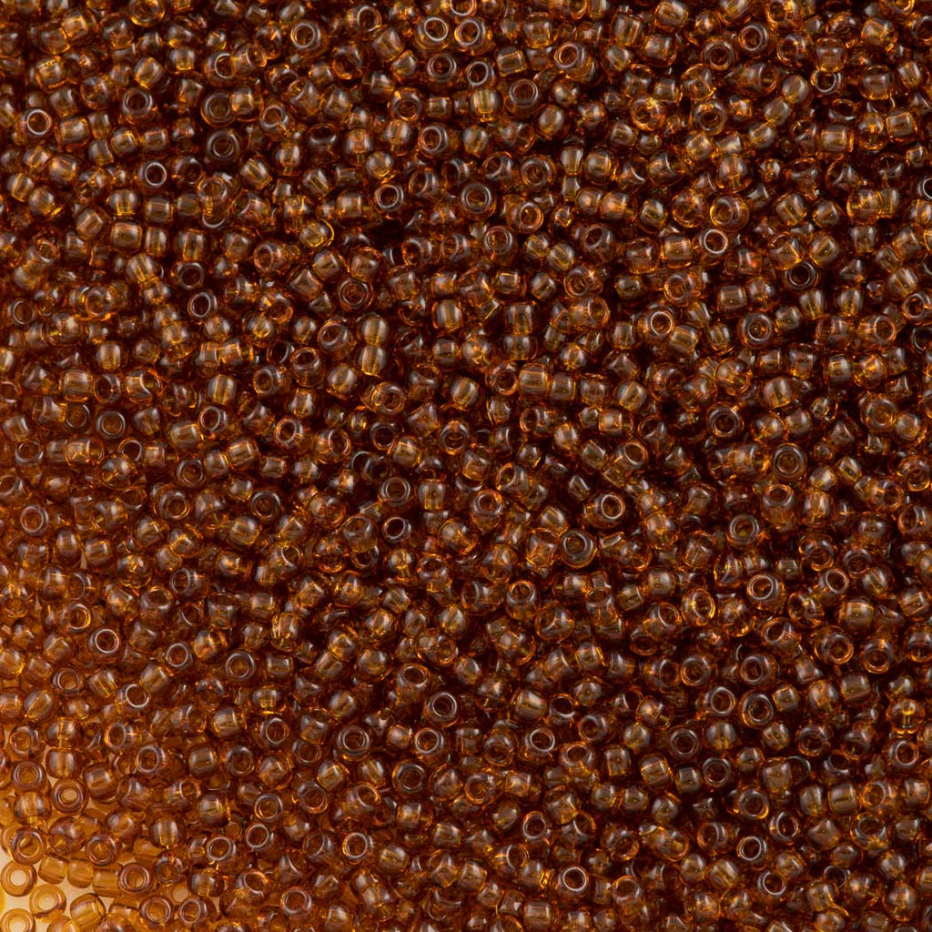 Preciosa Czech Seed Bead 11/0 Transparent Medium Topaz (10090)