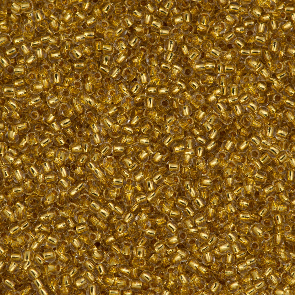 50g Toho Round Seed Bead 11/0 24kt Gold Lined Crystal (701)