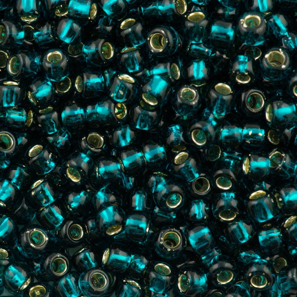 50g Toho Round Seed Beads 6/0 Silver Lined Dark Teal (27BD)