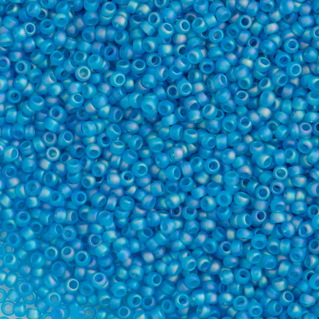 Toho Round Seed Bead 15/0 Transparent Matte Dark Caribbean AB 2.5-inch Tube (163BF)