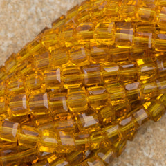 100 Faceted Cube 4mm Light Colorado Topaz Beads