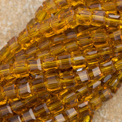 100 Faceted Cube 4mm Light Amber Beads