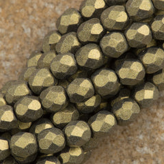 100 Czech Fire Polished 4mm Round Bead Metallic Suede Gold (79080)