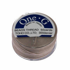 Toho One-G Nylon Beige Thread 50 yard bobbin