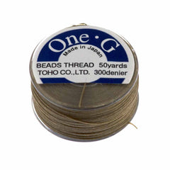 Toho One-G Nylon Sand Ash Thread 50 yard bobbin
