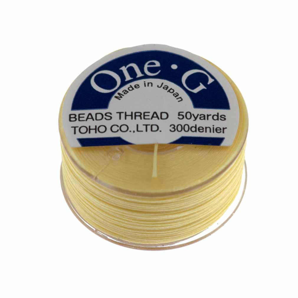 Toho One-G Nylon Light Yellow Thread 50 yard bobbin