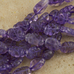 Amethyst Carved Oval 11x7mm Bead 16 inch Strand