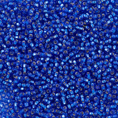50g Czech Seed Bead 10/0 Silver Lined Sapphire (37050)