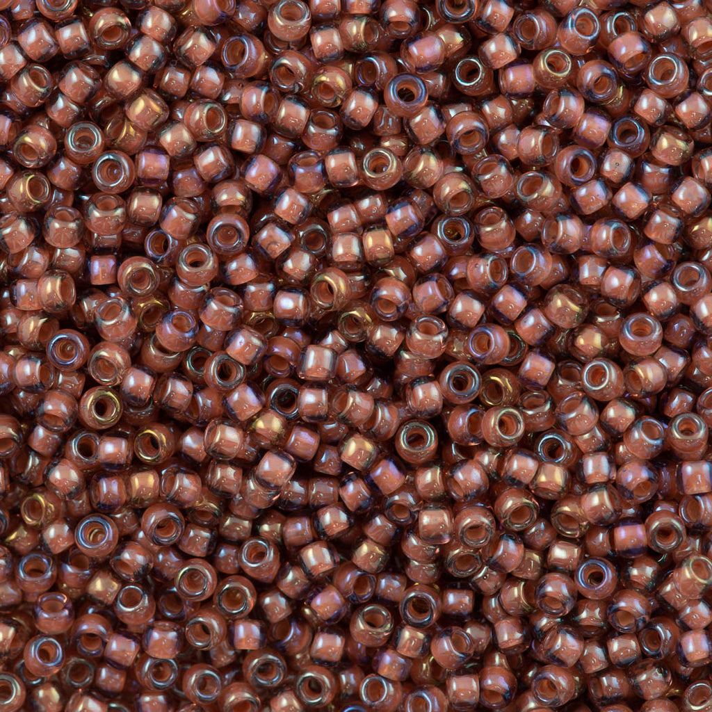 50g Toho Round Seed Bead 8/0 Inside Color Topaz Mauve Lined AB (1850)