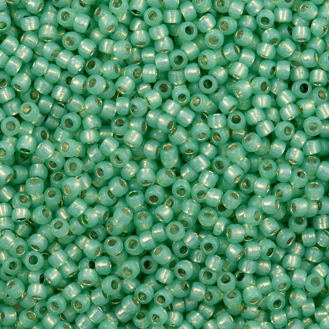 50g Toho Round Seed Bead 8/0 Silver Lined Milky Peridot (2103)