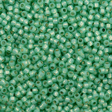 50g Toho Round Seed Bead 8/0 Silver Lined Milky Peridot (2103)