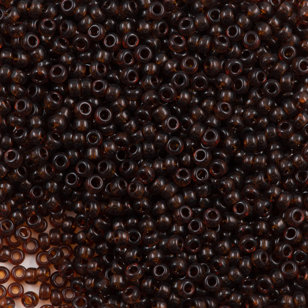 Miyuki Round Seed Bead 11/0 Transparent Dark Amber (134D)