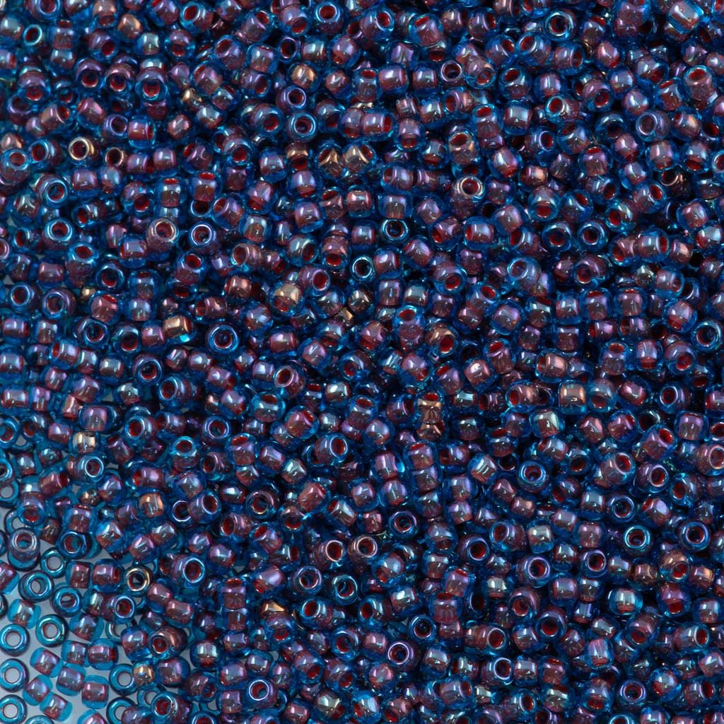 50g Toho Round Seed Beads 11/0 Aqua Inside Color Lined Oxblood Blue (381)