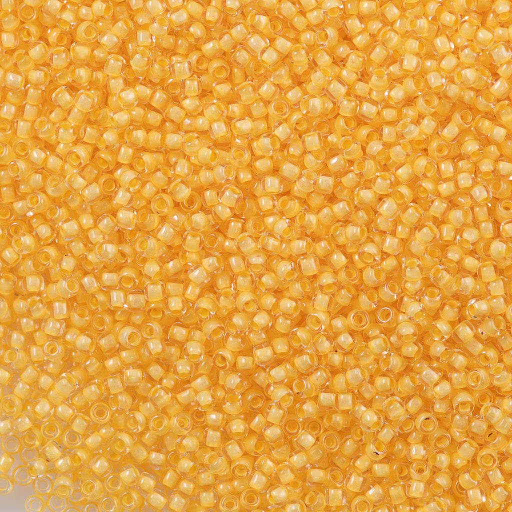 50g Toho Round Seed Bead 11/0 Inside Color Lined Butter (961)