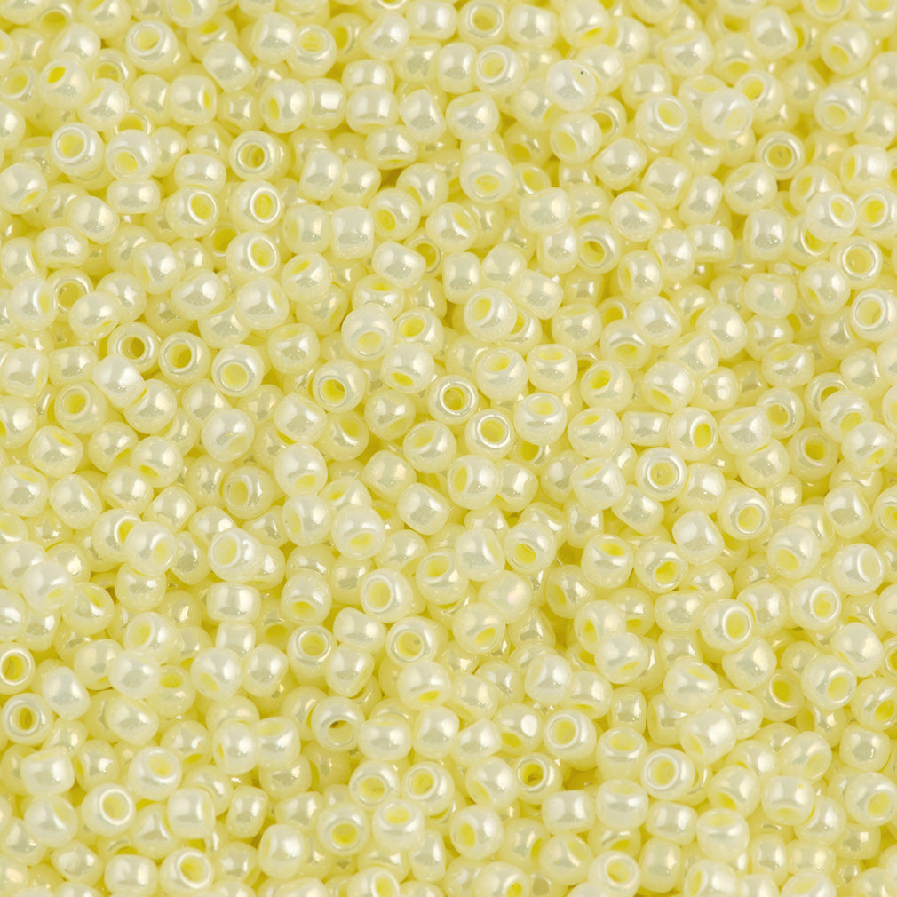 50g Toho Round Seed Beads 11/0 Transparent Ceylon Banana Cream (142)