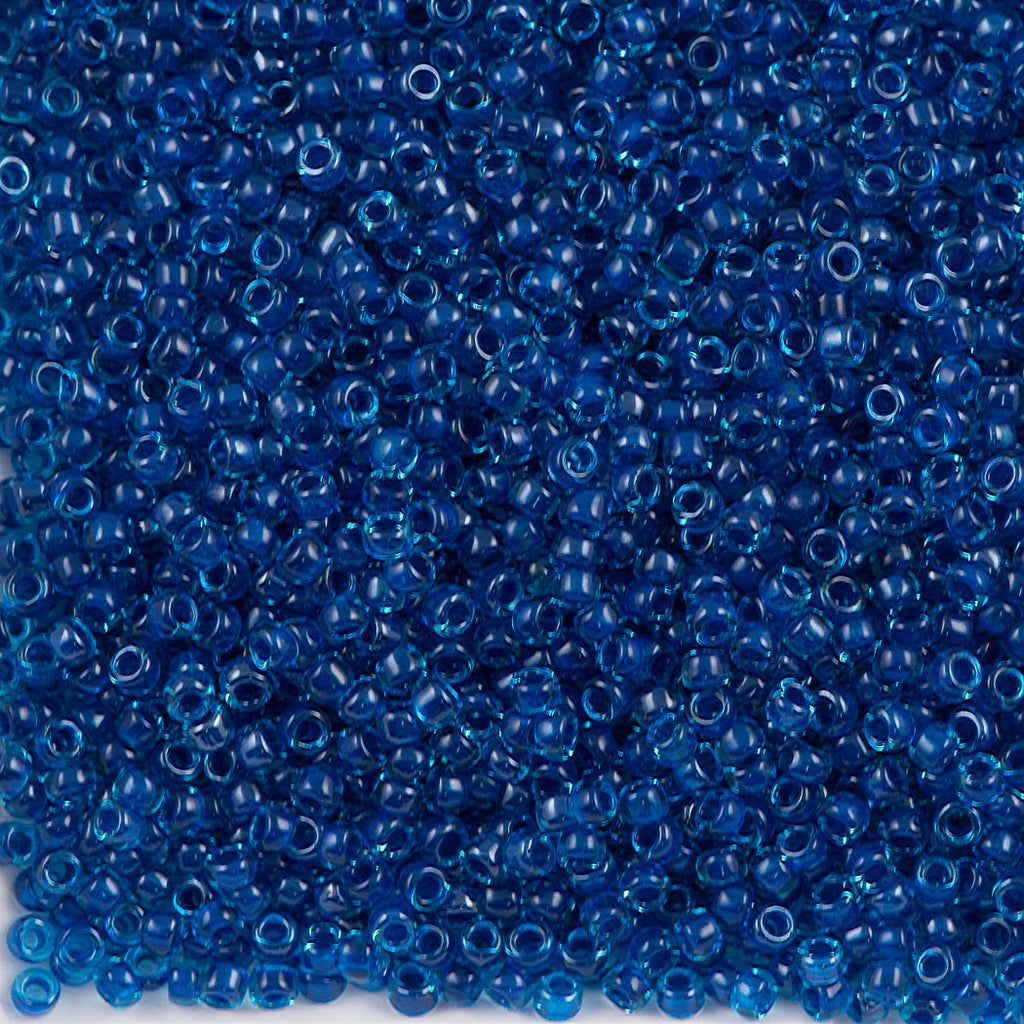 Toho Round Seed Bead 15/0 Inside Color Lined Aqua Capri (932)