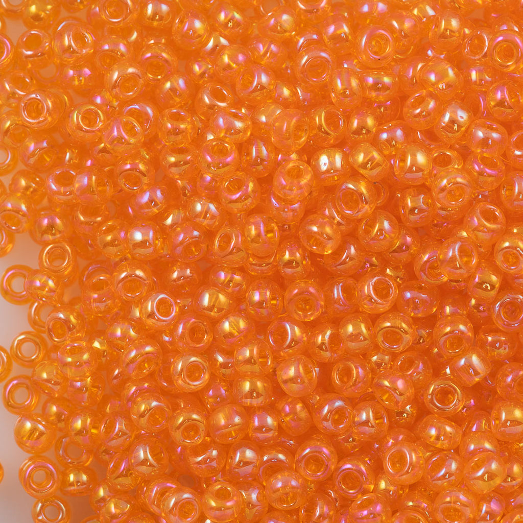 Toho Round Seed Beads 6/0 Transparent Orange AB 2.5-inch tube (174)