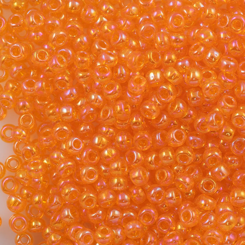 50g Toho Round Seed Beads 6/0 Transparent Orange AB (174)