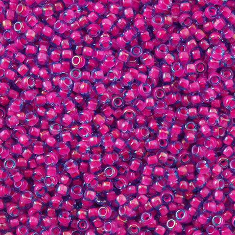 50g Toho Round Seed Bead 8/0 Luminous Light Sapphire Neon Pink Lined (980)