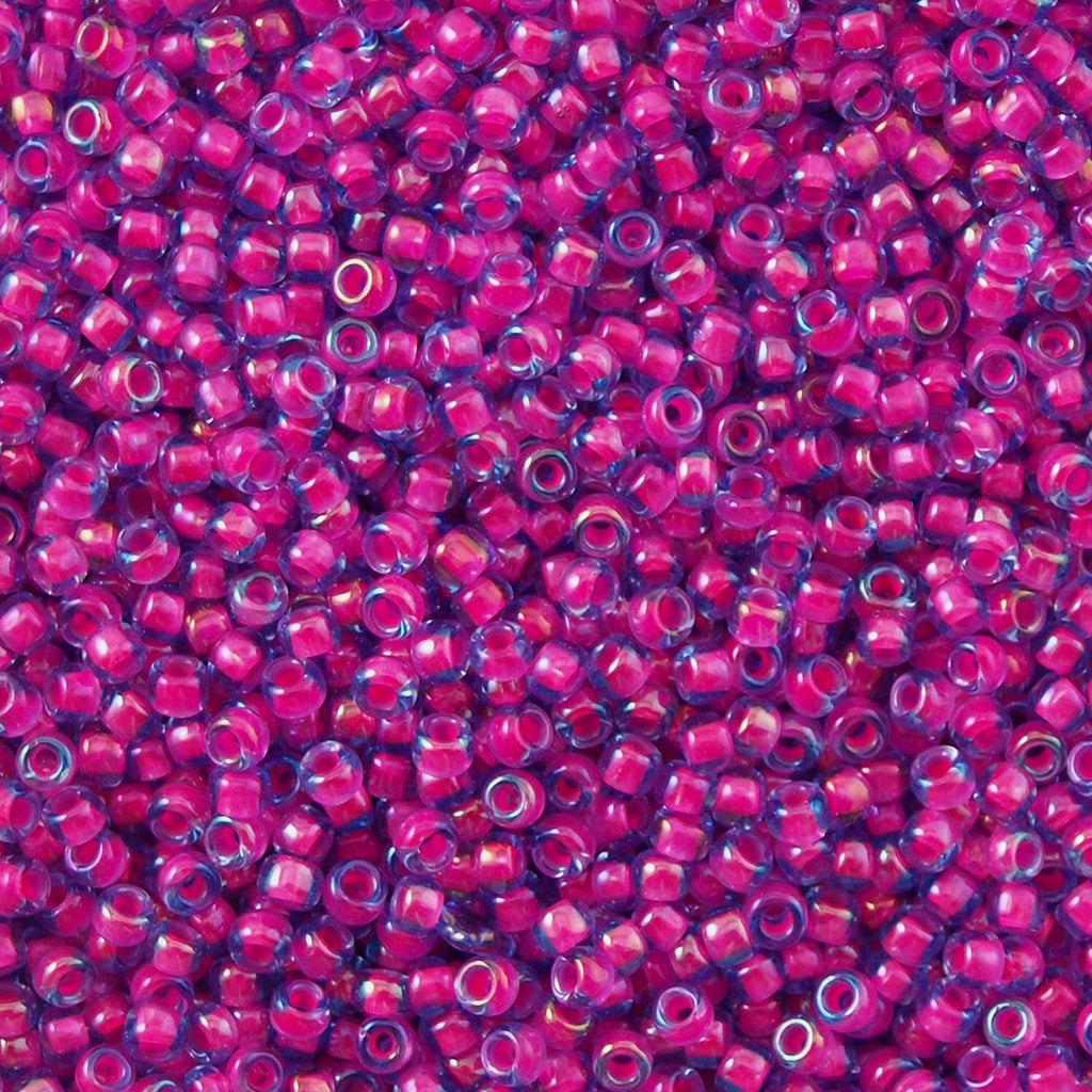 50g Toho Round Seed Bead 8/0 Luminous Light Sapphire Neon Pink Lined (980)
