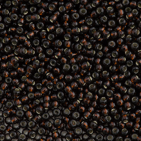 50g Toho Round Seed Bead 8/0 Silver Lined Root Beer (2205)
